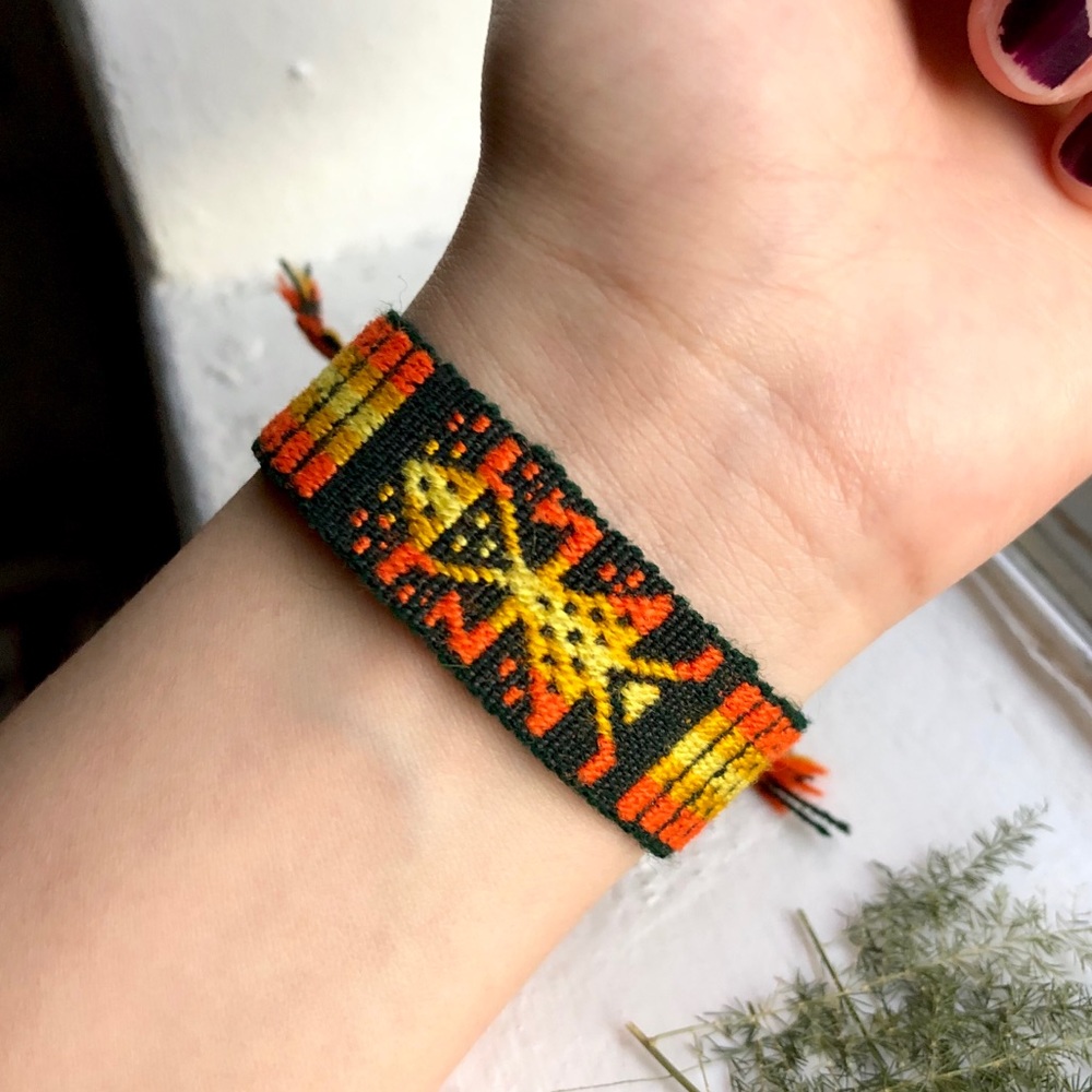 Traditional Doll Motif Woven Bracelet